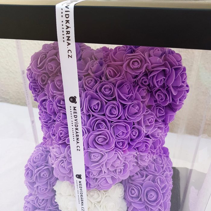 Purple rose bear with a white heart